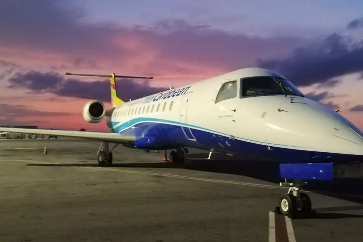 InterCaribbean plane on the apron at Sangster International Airport (MBJ) at sunset