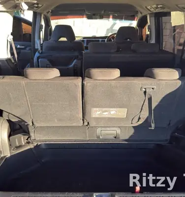 Luggage space in the Ritzy Tours JA van