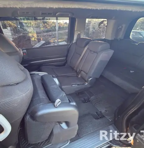 Spacious passenger seats in the Ritzy Tours JA van
